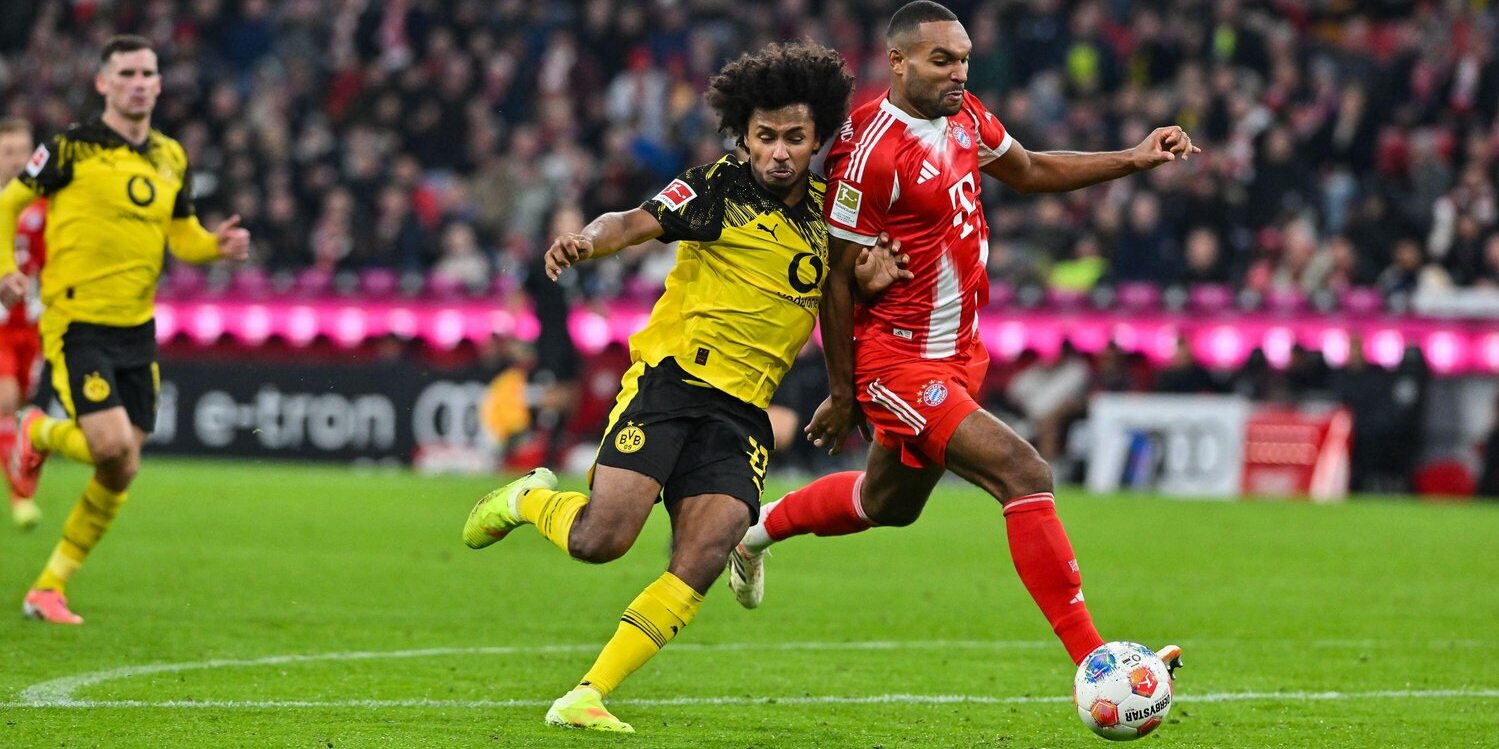 Karim Adeyemi und Jonathan Tah im Zweikampf beim Klassiker